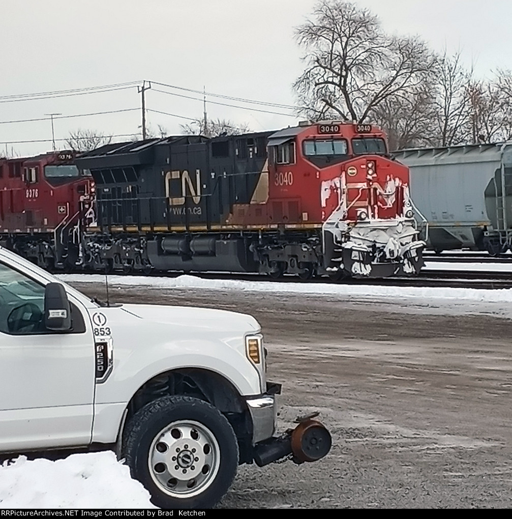 CN unit on CP freight